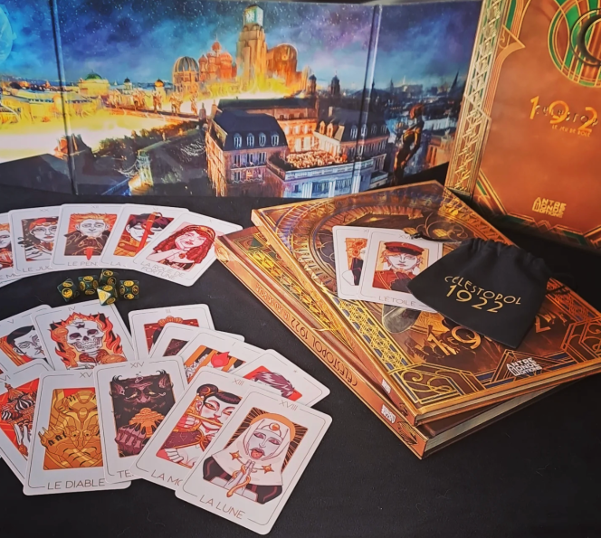 Coffret du jeu de rôle Célestopol 1922, dorures et style rétrofuturiste.